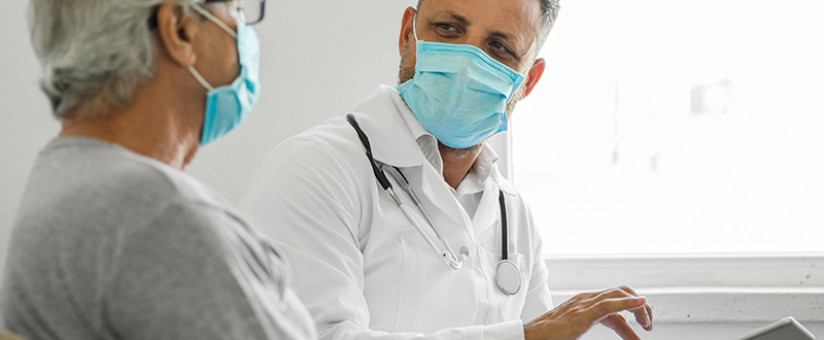 healthcare provider talking to a patient