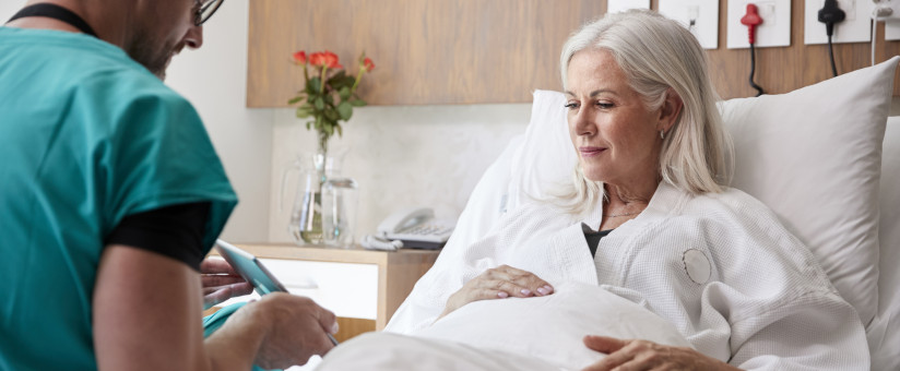 older woman in hospital bed